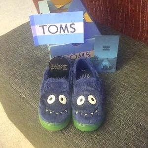 NIB Toms Glow in the dark Eyes slip on shoe. Size 9 toddler.